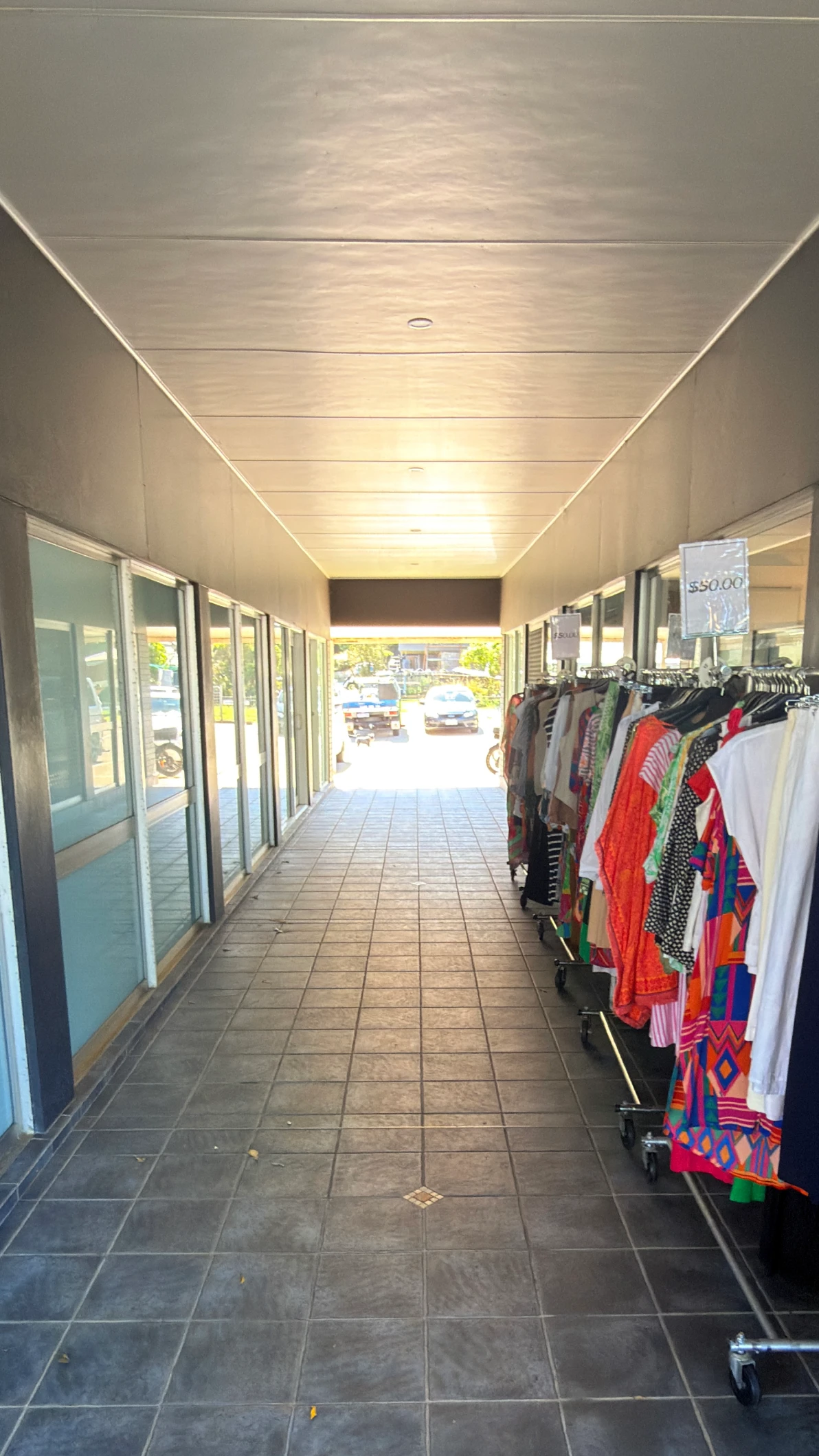 Commercial storefront before exterior cleaning in Yamba NSW by Be Clean Exteriors